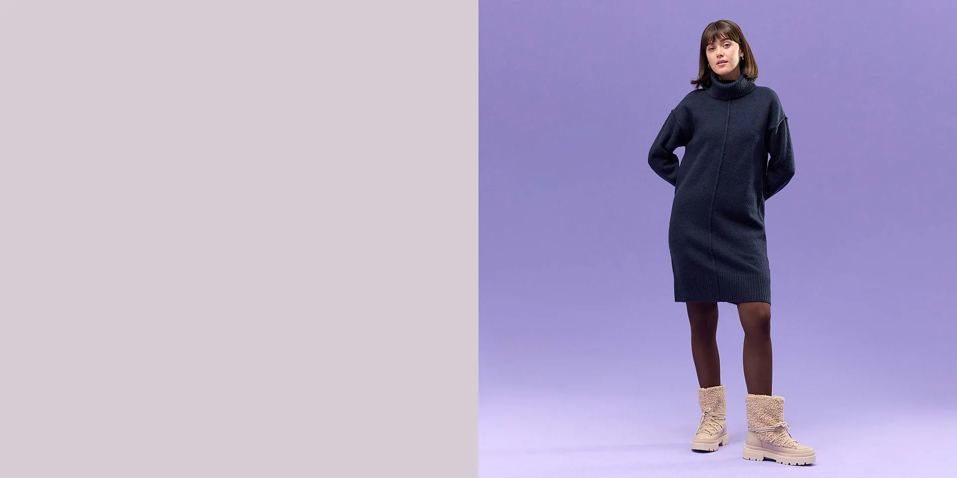 Elegante donkerblauwe gebreide jurk met col.