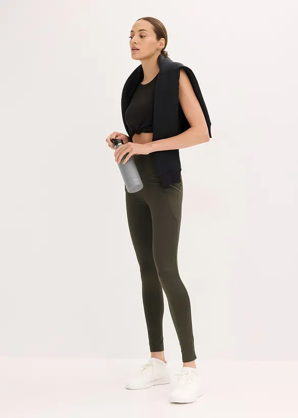 Thermo legging met reflecterende details en zakje voor smartphone, bonprix