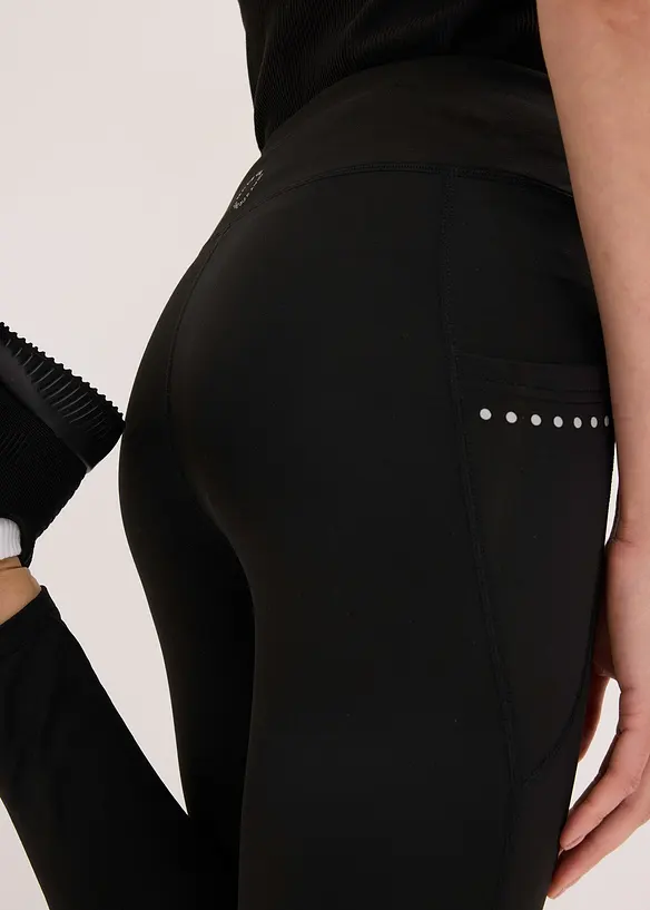Thermo legging met reflecterende details en zakje voor smartphone, bonprix