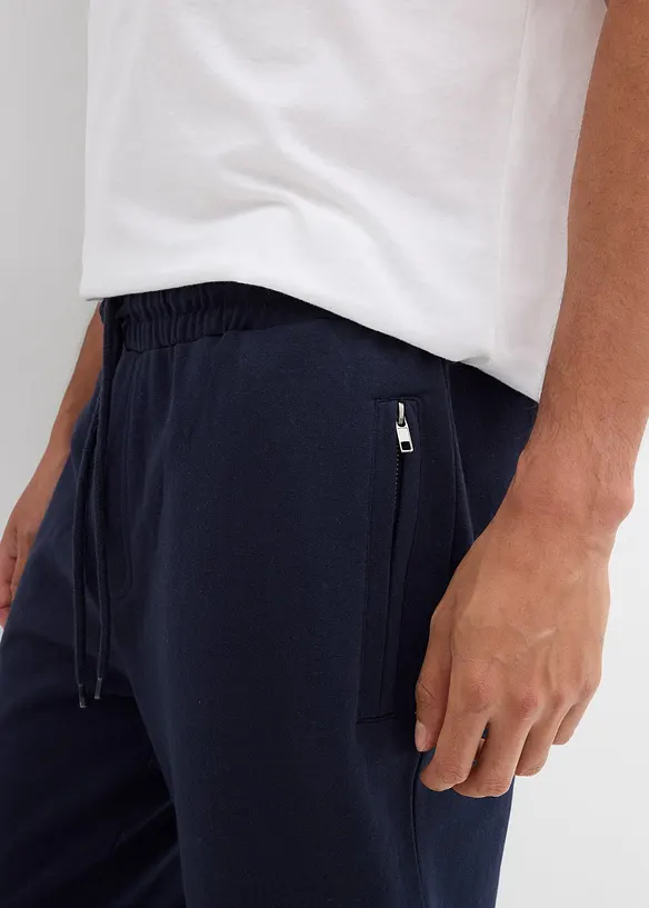 Joggingbroek met handige ritszakken, bonprix