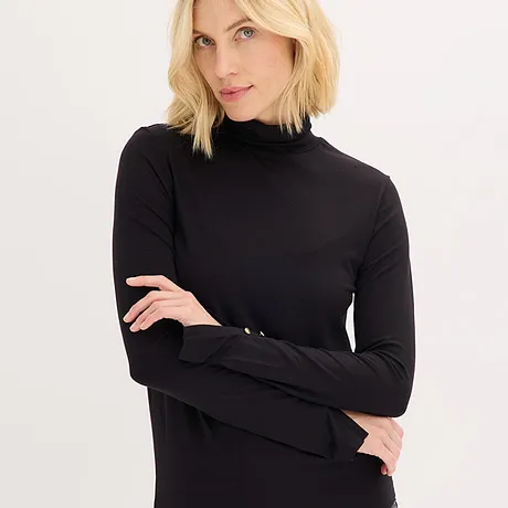 Zwarte coltrui met lange mouwen.