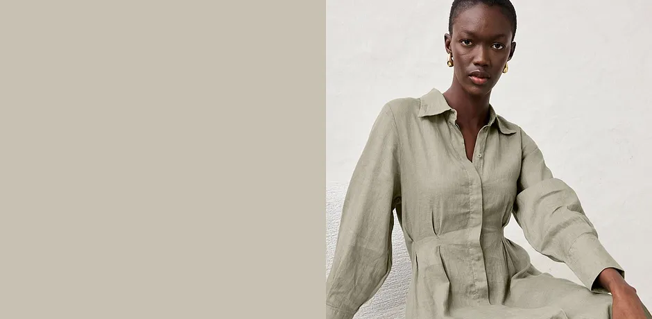 Elegante beige overhemdjurk van linnen met een kraag en lange mouwen, casual-chic en heerlijk luchtig voor de zomer.