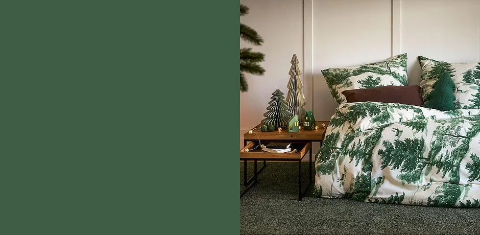 Met een dekbedovertrek met dennenmotief breng je kerstsfeer in je slaapkamer.