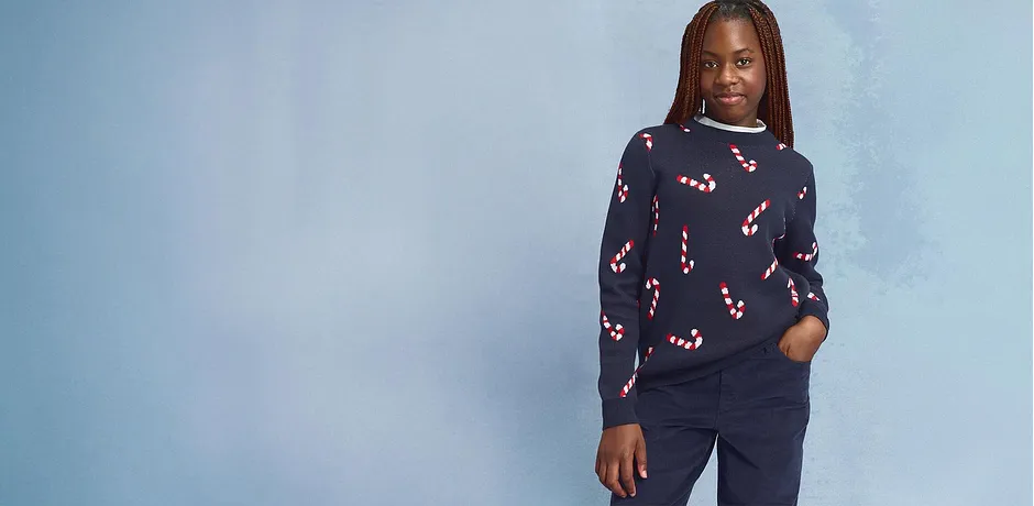 Kersttrui met zuurstokmotief.