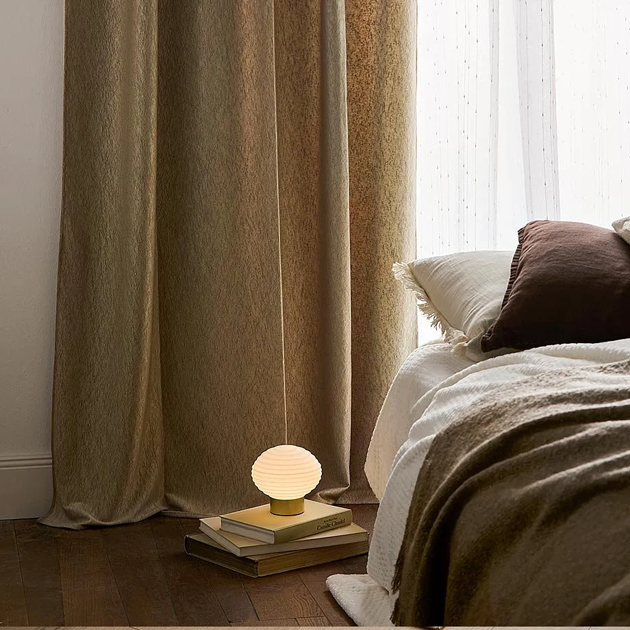 Mooi gordijn in de slaapkamer.