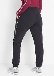 Sweatpants met tapes en statement print, bonprix