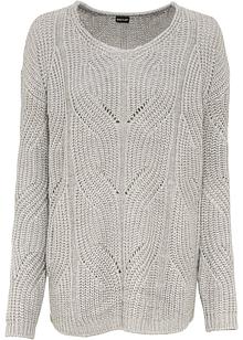 Volumineuze oversized gebreide trui met geribde details Volumineuze oversized gebreide trui met geribde details