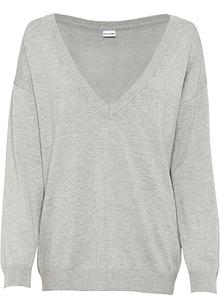 Volumineuze oversized gebreide trui met geribde details Volumineuze oversized gebreide trui met geribde details
