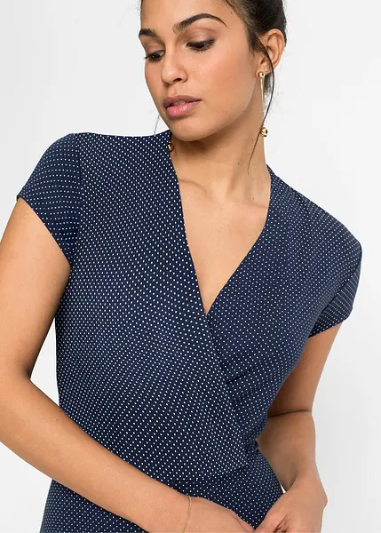 Mooie jersey jurk in wikkellook met een strikceintuur in de taille