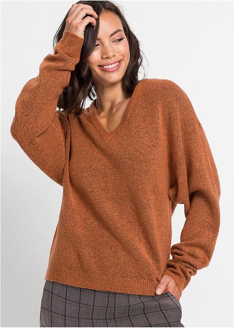 Volumineuze oversized gebreide trui met geribde details Volumineuze oversized gebreide trui met geribde details