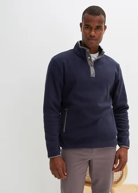 Fleece schipperstrui met handige zakken en een opstaande kraag, bonprix