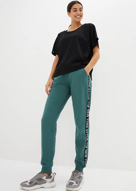 Sweatpants met tapes en statement print, bonprix