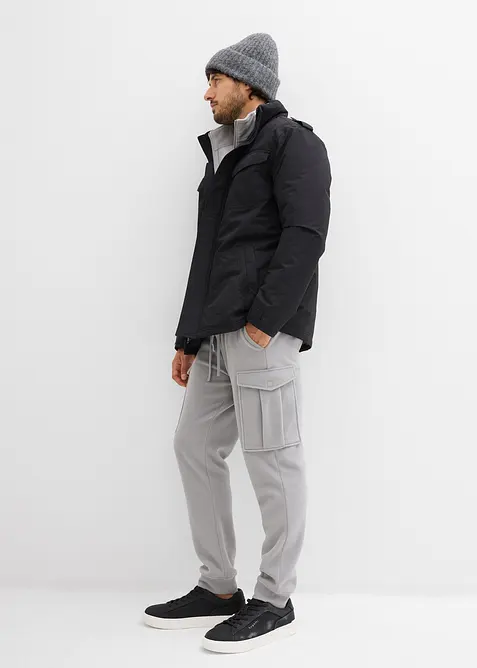 Waterdichte outdoor jas met oprolbare capuchon en epauletten, bonprix