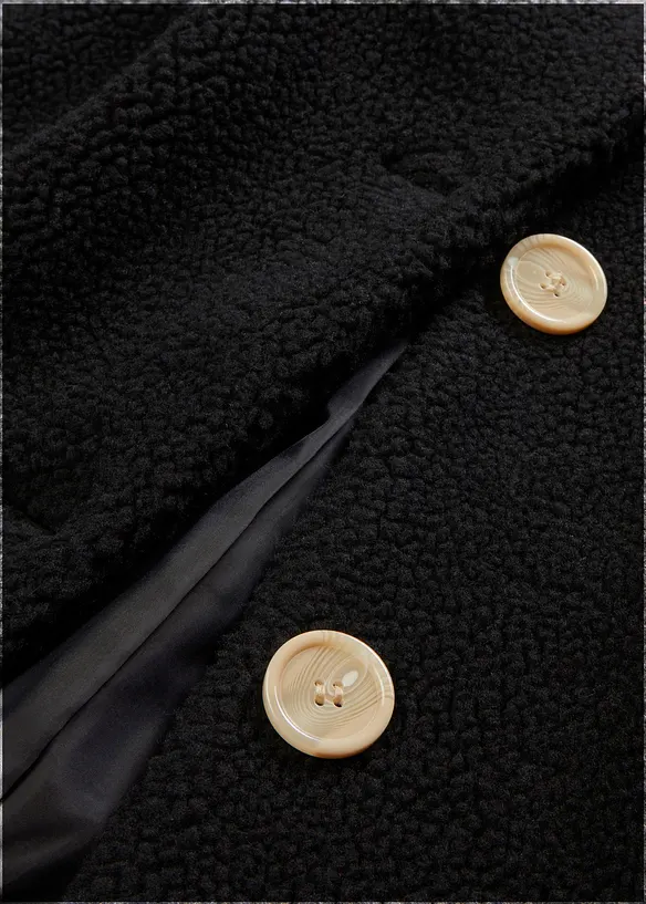 Lange teddy jas met capuchon en zakken, bonprix