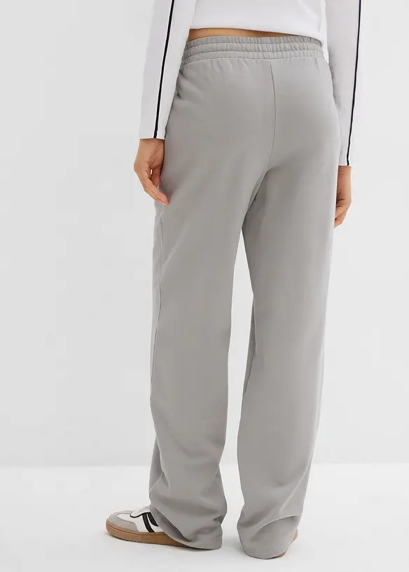 Sweatpants met wijde pijpen met ster van puur biologisch katoen., bonprix
