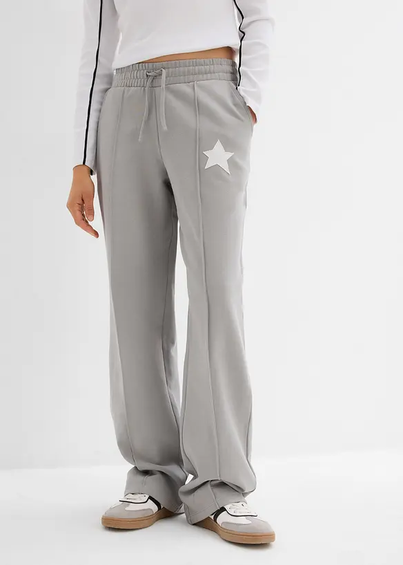 Sweatpants met wijde pijpen met ster van puur biologisch katoen., bonprix