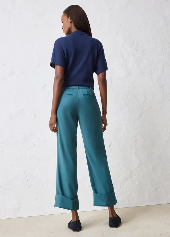 Flared broek met wol, bonprix