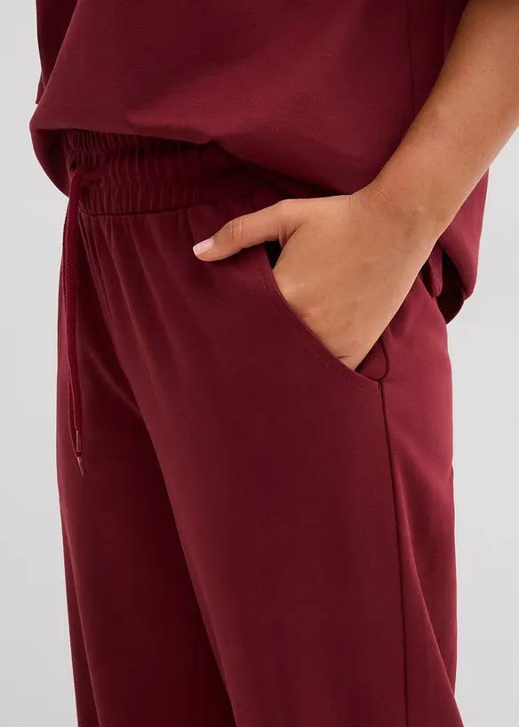 Wijde jersey broek van interlock, bonprix